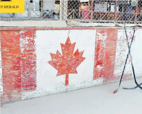  ?? PHOTO BY GLOBAL AFFAIRS CANADA ?? The faded boards adorned with the Maple Leaf from Kandahar Airfield’s ball hockey rink are returning to Canada, intended to be exhibited at the Canadian War Museum in Ottawa and the Hockey Hall of Fame in Toronto.
