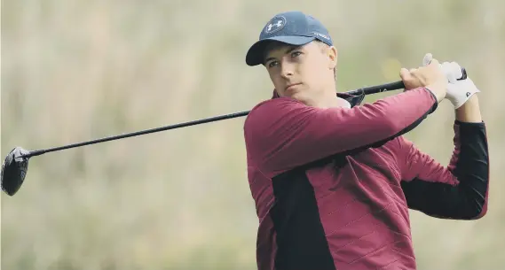  ??  ?? Leader Jordan Spieth plays a drive during his one-under-par 69 at Royal Birkdale on day two of the Open Championsh­ip