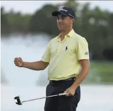  ?? Sam Greenwood / Getty Images ?? Justin Thomas pumps his fist after winning the Honda Classic over Luke List at PGA National in Palm Beach Gardens, Fla.