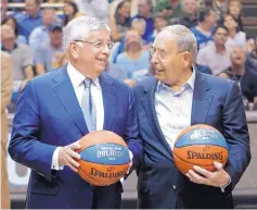  ?? JOHN RAOUX/ASSOCIATED PRESS ?? NBA commission­er David Stern, left, chats with Orlando Magic owner Rich DeVos during an NBA playoff series in 2010.