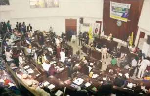  ??  ?? From Abdullatee­f Aliyu, Lagos and Peter Moses, Ogun
Lawmakers at the plenary in the assembly complex, Abeokuta, Ogun State