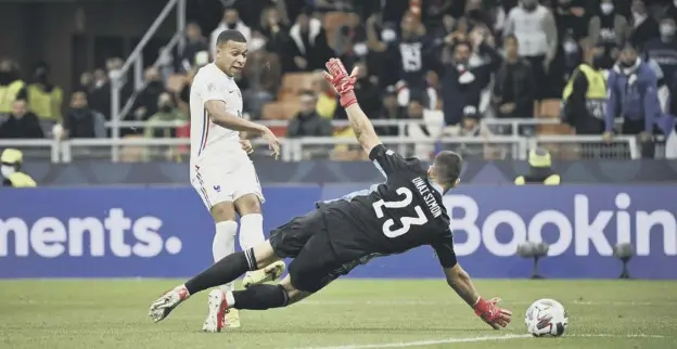  ?? ?? 0 France forward Kylian Mbappe fires the ball past Spain goalkeeper Unai Simon to score his team’s second goal in last night’s Nations League final at the San Siro in Milan