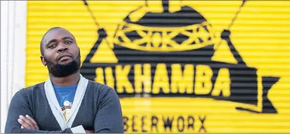  ??  ?? DRIVEN: Lethu Tshabangu, owner of Ukhamba Beerworx in Woodstock, is a unique beer brew master in the Mother City with local and national distributi­ons.