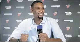  ?? AP FILE PHOTO ?? Heat forward Chris Bosh, seen at a news conference a year ago in Miami, has had each of his past two seasons halted by blood clots and has not been cleared to be with his team for training camp that starts Tuesday in the Bahamas.