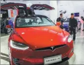  ?? PROVIDED TO CHINA DAILY ?? A Tesla Model X is displayed at an internatio­nal auto show in Pudong, Shanghai, on Sept 28.