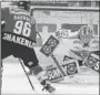  ?? CANADIAN PRESS FILES ?? Damien Brunner scores during Swiss League action Wednesday. He leads the league in scoring.