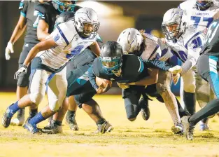  ?? JOHN SUDBRINK/SPECIAL TO THE DAILY PRESS ?? Woodside's Tyler Thompson dives for short yardage on Friday. See more photos at dailypress.com/sports.