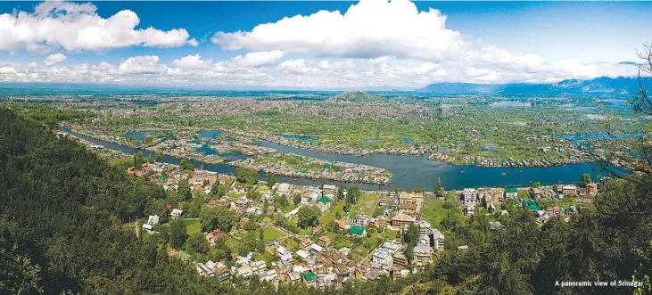  ??  ?? A panoramic view of Srinagar