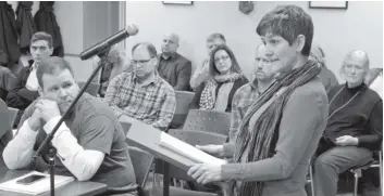  ?? [LIZ BEVAN / THE OBSERVER] ?? Hawkesvill­e’s Beth Franks spoke out Tuesday night against Wellesley council’s plan to designate more agricultur­al property in the settlement as employment lands.