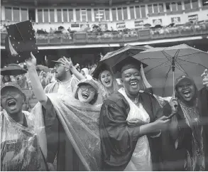  ??  ?? Graduating New York University students gave Prime Minister Justin Trudeau a warm welcome in a rainy Yankee Stadium.