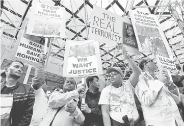  ??  ?? Members of the Rohingya community in Australia rally outside the Department of Foreign Affairs and Trade in Melbourne, Australia. — Reuters photo