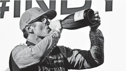  ??  ?? Scott Dixon celebrates after winning the Verizon IndyCar Series’ Honda Indy Toronto race Sunday.