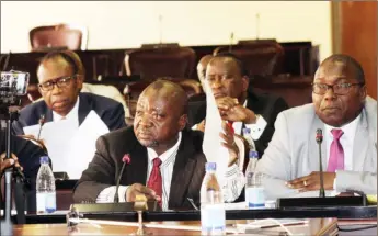  ??  ?? Secretary for Defence Mr Martin Rushwaya flanked by Anjin deputy general manager Mr Shingirai Manyeruke (right) appears before the Parliament­ary Portfolio Committee on Mines and Energy in Harare yesterday. — (Picture by Tawanda Mudimu)