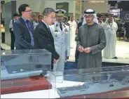  ?? PROVIDED TO CHINA DAILY ?? Mohammed bin Zayed Al Nahyan, Crown Prince of Abu Dhabi, is briefed on China-developed frigates as he visits the China State Shipbuildi­ng Corp booth at the Internatio­nal Defense Exhibition and Conference in the United Arab Emirates.
