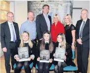  ?? ?? On fire Coatbridge High runners-up (from left) Alex, Leah and Logan are pictured with (back) education convener Frank McNally, dragons Danny Murphy, Scott Webb, Denise Canning and Joanne Telfer, and enterprise convener Allan Graham