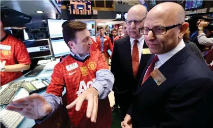  ??  ?? Joel and Avram Glazer at the initial public offering of Manchester United shares on the floor of the New York Stock Exchange in August 2012. Photograph: Justin Lane/EPA