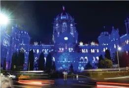  ?? — PTI ?? The CSMT station is illuminate­d in blue light on the occasion of 30 years of the Convention on the Rights of the Child in Mumbai on Wednesday. The convention was adopted by the UN General Assembly on November 20, 1989.