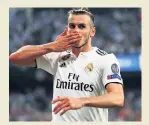  ??  ?? REAL DEAL Bale celebrates last night