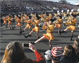  ??  ?? The Kyoto Tachibana High School Band of Japan performs at the 129th Rose Parade in Pasadena on Monday.