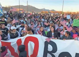  ?? RICK JERVIS/USA TODAY ?? As President Donald Trump promotes his plan for a wall along the U.S.-Mexican border, opponents voice their dismay at a rally about a mile away from the El Paso County Coliseum on Monday.