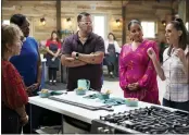  ?? PBS VIA AP ?? Judges Tiffany Derry, from second left, Graham Elliot, host Alejandra Ramos and judge Leah Cohen gather around d a contestant’s station in a scene from the competitio­n series “The Great American Recipe.”