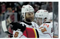  ?? KEVORK DJANSEZIAN/GETTY IMAGES ?? Forward Johnny Gaudrea, right, is seen as one of the stars who should bring good future results for the Calgary Flames.