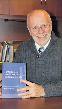  ??  ?? Dans son livre, l’agroéconom­iste Bernard Belzile rend hommage aux artisans de la première heure des syndicats de gestion, aujourd’hui appelés « groupescon­seils ».