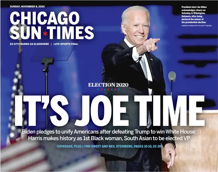  ?? ANDREW HARNIK/ AFP VIA GETTY IMAGES ?? President- elect Joe Biden acknowledg­es cheers on Saturday in Wilmington, Delaware, after being declared the winner of the presidenti­al election.