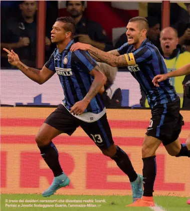  ?? IPP ?? Il treno dei desideri nerazzurri che diventano realtà: Icardi, Perisic e Jovetic festeggian­o Guarin, l’ammazza-Milan