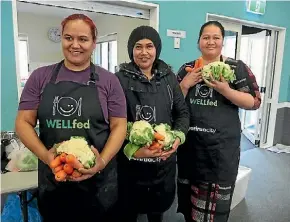  ??  ?? From left, Orion Johnson, Beddy Otukolo and Ana Patelesio during a recent WELLfed session at Holy Family School in Porirua.