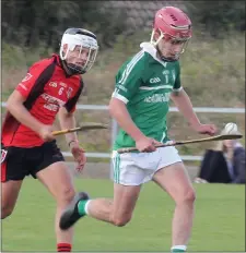  ??  ?? Patrick Whitty of Cloughbawn races away from Aaron Doyle.