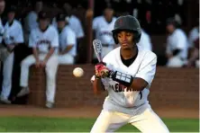  ?? Staff photo by Jerry Habraken ?? n Liberty-Eylau’s Darian Walker eyes a pitch that is high of the strike zone Tuesday during their game against Paris at Leopard Field at H.E. Markham Park in Texarkana, Texas.