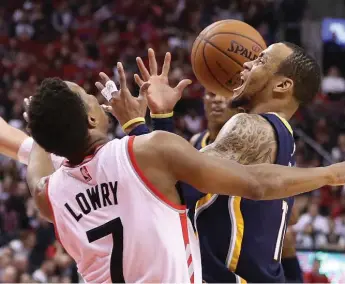  ?? STEVE RUSSELL/TORONTO STAR ?? Kyle Lowry’s tenacious D on Indy’s Monta Ellis was one piece of the puzzle in the Raptors’ exciting Game 5 victory.