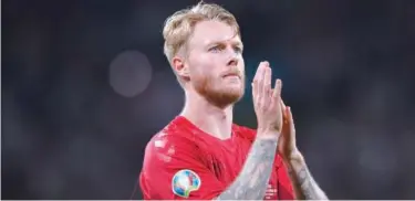  ?? Associated Press ?? ↑
Denmark’s Simon Kjaer scored an own goal in the crucial Euro semi-final against against England.