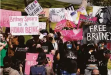  ?? Chris Pizzello / Associated Press ?? Britney Spears’ fans protest in March outside a court hearing concerning the pop singer’s conservato­rship in Los Angeles.