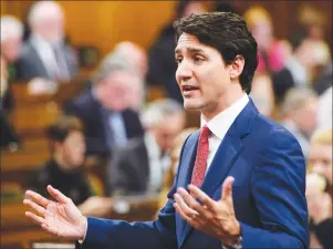  ?? CP PHOTO ?? Prime Minister Justin Trudeau stands during question period in the House of Commons on Parliament Hill in Ottawa on Wednesday.