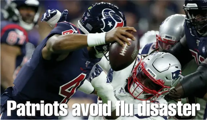  ?? NANCY LANE / HERALD STAFF ?? GOOD ENOUGH TO GO: Among the players battling the flu, linebacker Dont’a Hightower pressures Deshaun Watson during the first quarter last night.