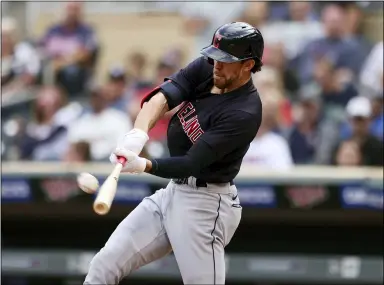  ?? STACY BENGS — THE ASSOCIATED PRESS ?? Indians’ Bradley Zimmer hits a homer during the fifth inning of a doublehead­er against the Twins Sept. 14in Minneapoli­s. Cleveland won 3-1.