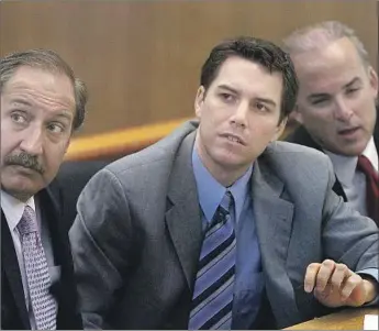 ?? Pool photo ?? DURING HIS 2004 trial, Scott Peterson sits between attorneys Mark Geragos, left, and Pat Harris. Peterson was convicted of murdering his wife and unborn son. His death sentence was reversed this year.
