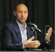  ?? TAIMY ALVAREZ — SOUTH FLORIDA SUN-SENTINEL VIA AP, FILE ?? In this file photo, Miami Marlins part owner Derek Jeter speaks during a press conference in Miami. Jeter is trying to revive a moribund Marlins franchise, and so far the former New York Yankees captain appears out of his league as a CEO.