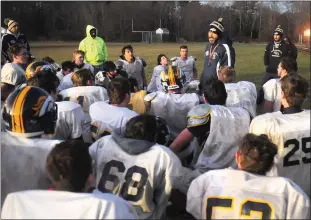  ?? Photo by Ernest A. Brownn ?? Burrillvil­le football coach Gennaro Ferraro (center) had a simple message for his Broncos as they prepared for today’s Super Bowl: The past doesn’t matter. All that matter’s is today’s game.