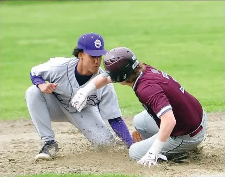  ?? Photo by Ernest A. Brown ?? St. Raphael senior infielder Cam Wilson, left, will play his college baseball in Springfiel­d, Mass., playing for Division II American Internatio­nal College. The Yellow Jackets playing in the Northeast-10.