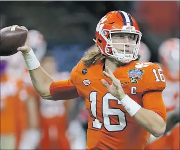  ?? John Bazemore Associated Press ?? TREVOR LAWRENCE will be the third quarterbac­k the Jaguars draft in the first round in the last 10 years.