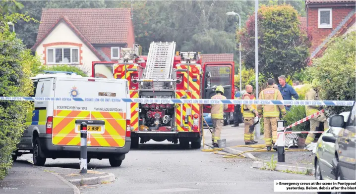  ?? Rob Browne ?? > Emergency crews at the scene in Pontypool yesterday. Below, debris after the blast