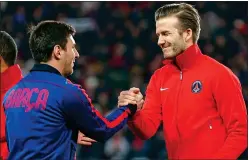  ??  ?? SHAKE ON IT: Beckham wants Messi to end his glittering career at Inter Miami