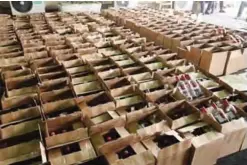  ??  ?? KUWAIT: A picture released by the Interior Ministry yesterday showing cardboard boxes containing liquor bottles found inside a shipment that arrived to Shuaiba Port yesterday.