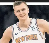  ??  ?? KRISTAPS PORZINGIS Exited Nets game with knee pain.