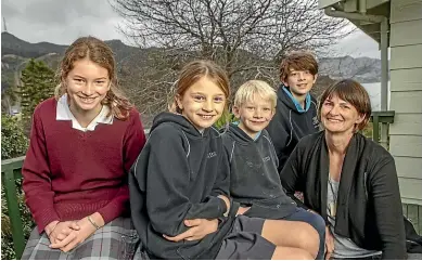  ?? JOHN KIRK-ANDERSON/STUFF ?? Laura Keogh, right, with the inspiratio­ns behind her business, from left: Ella, 12, Meg, 10, Tom, 7, and Zak Jeffrey, 12.