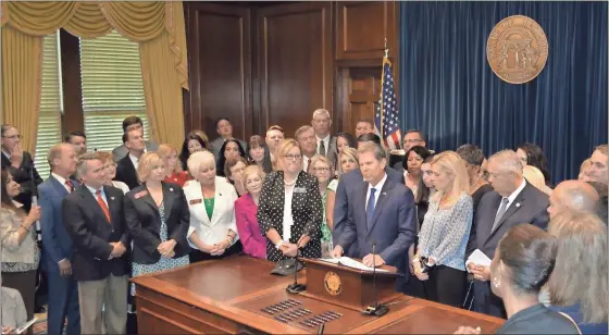  ?? Staff / Ricky Leroux, File ?? Gov. Brian Kemp speaks at a news conference at the Georgia Capitol in 2019 ahead of signing HB 481, which bans most abortions once a doctor detects a fetal heartbeat.