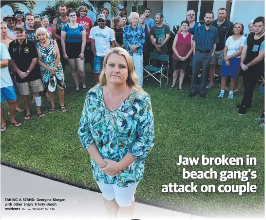  ?? Picture: STEWART McLEAN ?? TAKING A STAND: Georgina Morgan with other angry Trinity Beach residents.